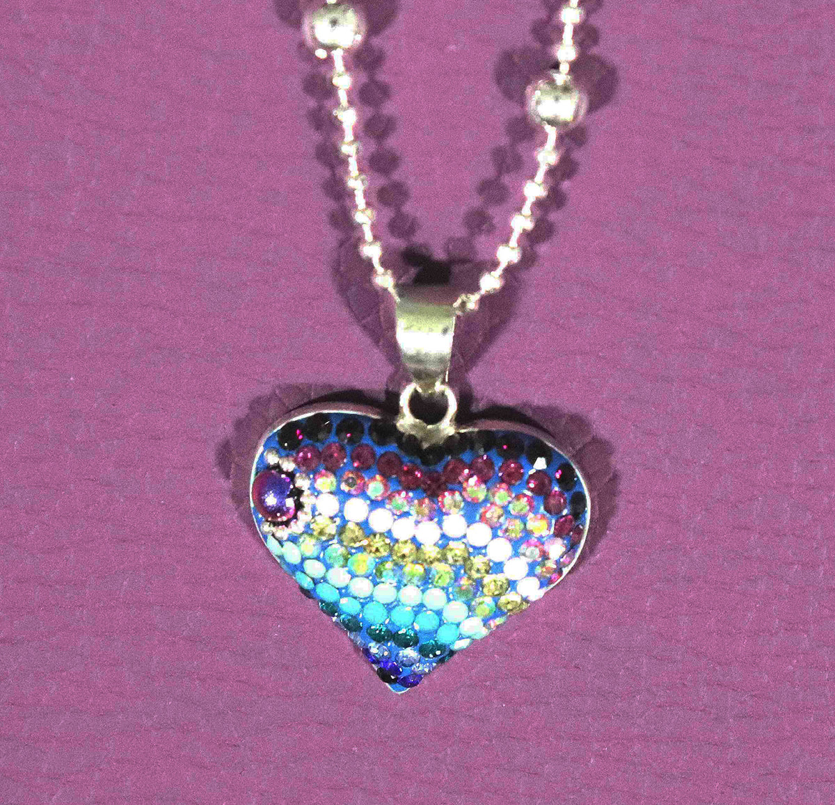 Sparkling Spectrum Rainbow Heart Sterling Silver Necklace with Synthetic Stones.