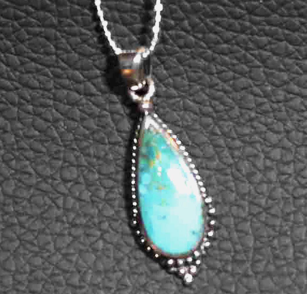 Elegant Sterling Silver Pear-Shaped Aqua Blue Stone Pendant with Vintage Design on Striking Italian Diamond-Cut Ball Chain