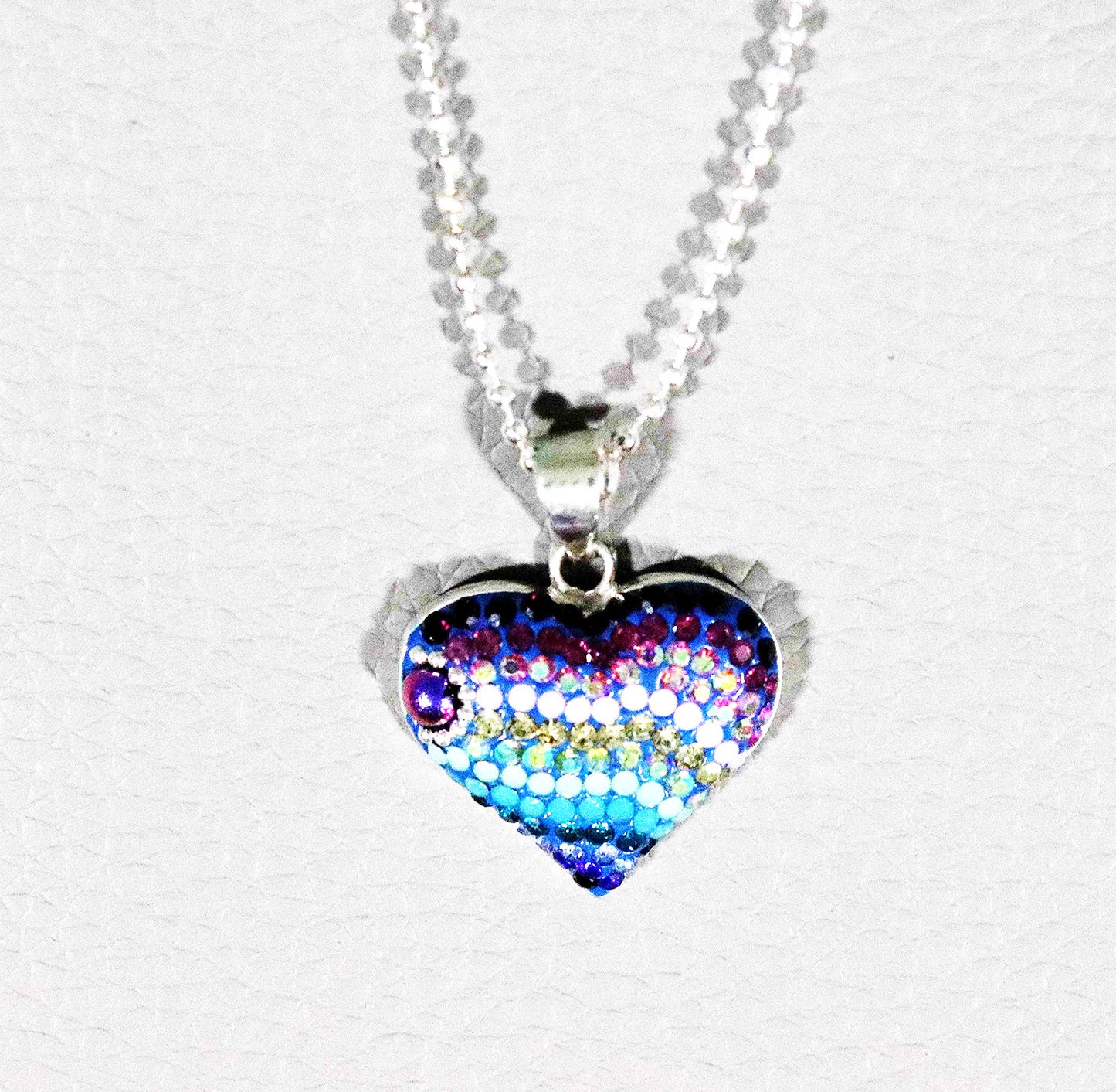 Sparkling Spectrum Rainbow Heart Sterling Silver Necklace with Synthetic Stones.
