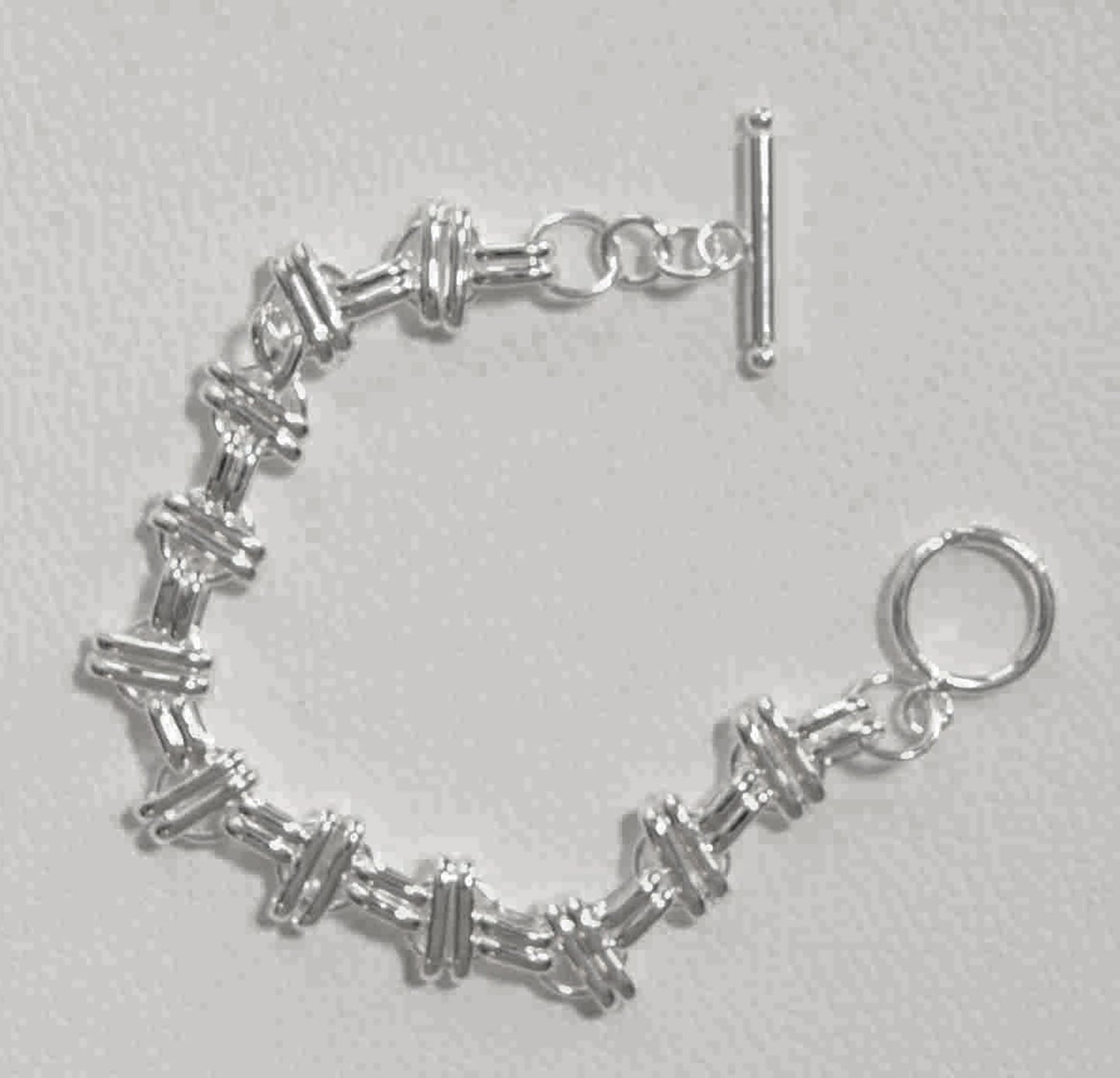 Sterling Silver Interlinked Grace Double Bar and Spaced Circles Bracelet with Toggle Clasp