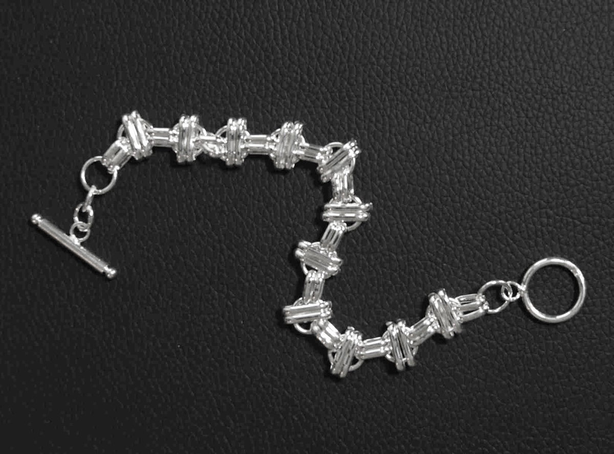 Sterling Silver Interlinked Grace Double Bar and Spaced Circles Bracelet with Toggle Clasp