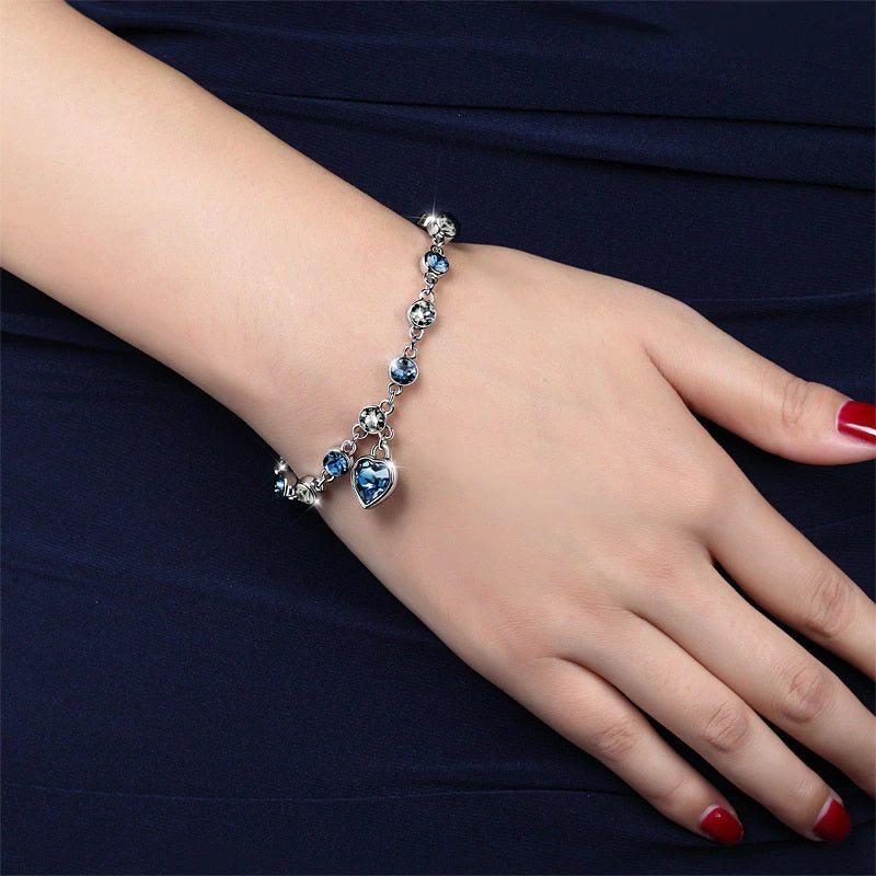 Elegant Sterling Silver Heart Bracelet with Blue Zirconia
