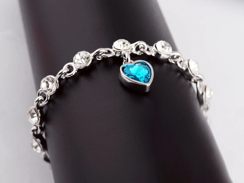 Elegant Sterling Silver Heart Bracelet with Blue Zirconia