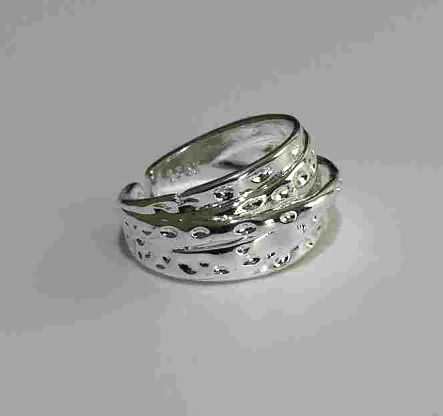 Bound by Love Sterling Silver Puzzle Motif Adjustable Ring