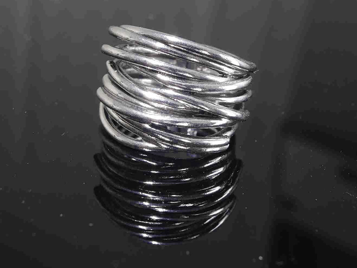 Endless Connection Sterling Silver Adjustable Puzzle Motif Ring