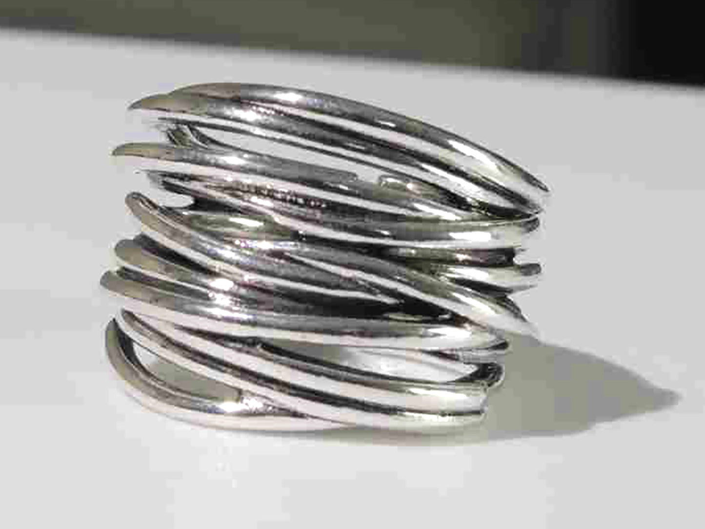 Endless Connection Sterling Silver Adjustable Puzzle Motif Ring