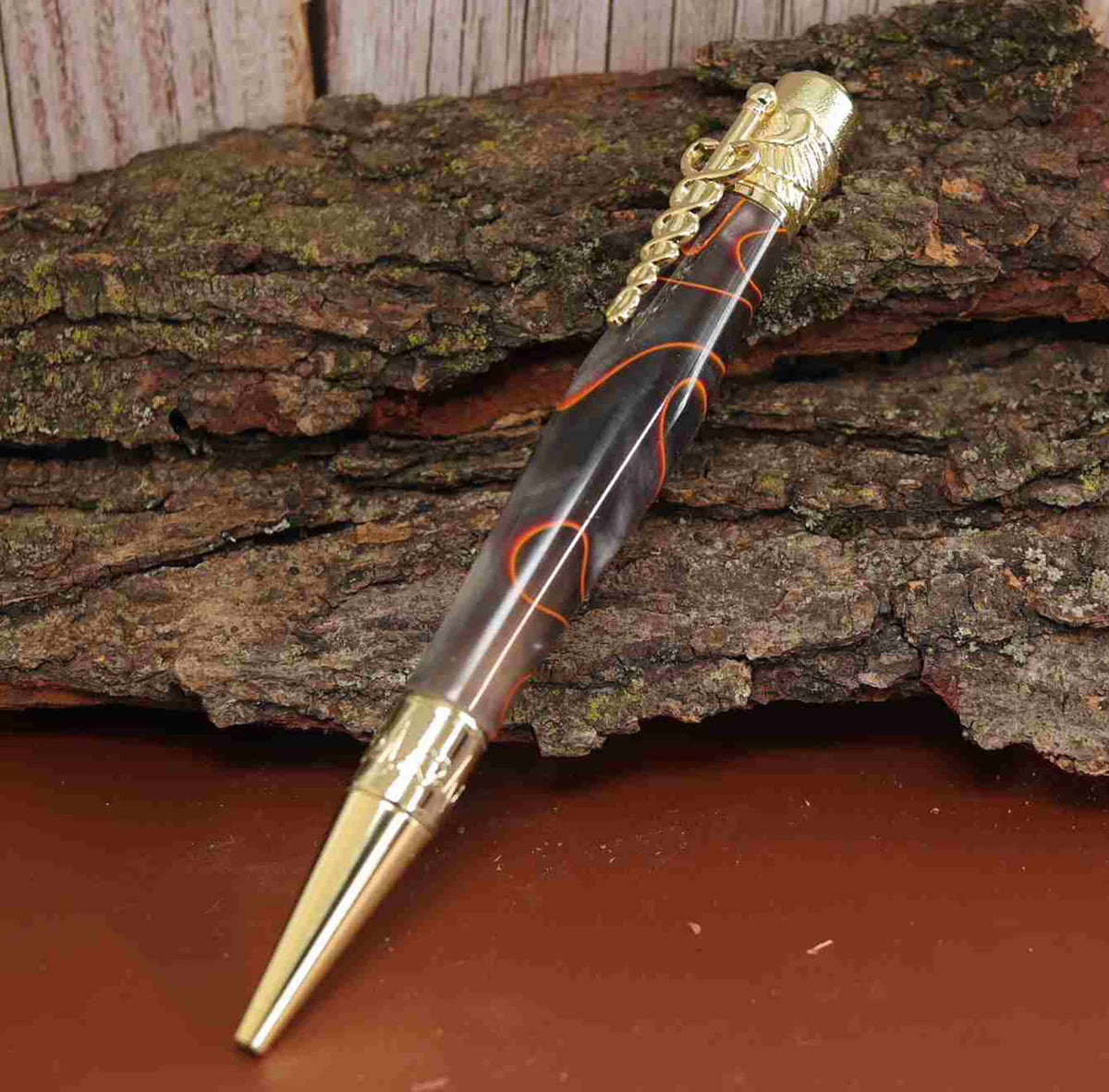 A Bold Tribute to Healthcare Heroes: Handcrafted Orange, Black, and Silver Spectrum Acrylic Caduceus Twist Pen with Golden Hardware