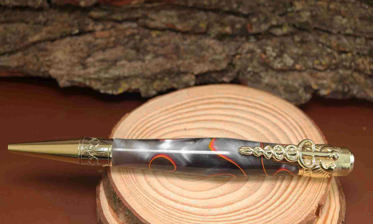 A Bold Tribute to Healthcare Heroes: Handcrafted Orange, Black, and Silver Spectrum Acrylic Caduceus Twist Pen with Golden Hardware