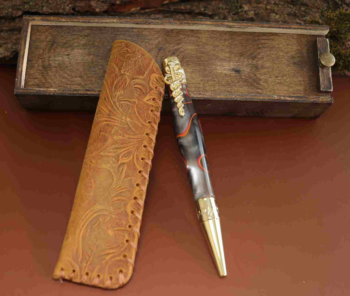 A Bold Tribute to Healthcare Heroes: Handcrafted Orange, Black, and Silver Spectrum Acrylic Caduceus Twist Pen with Golden Hardware