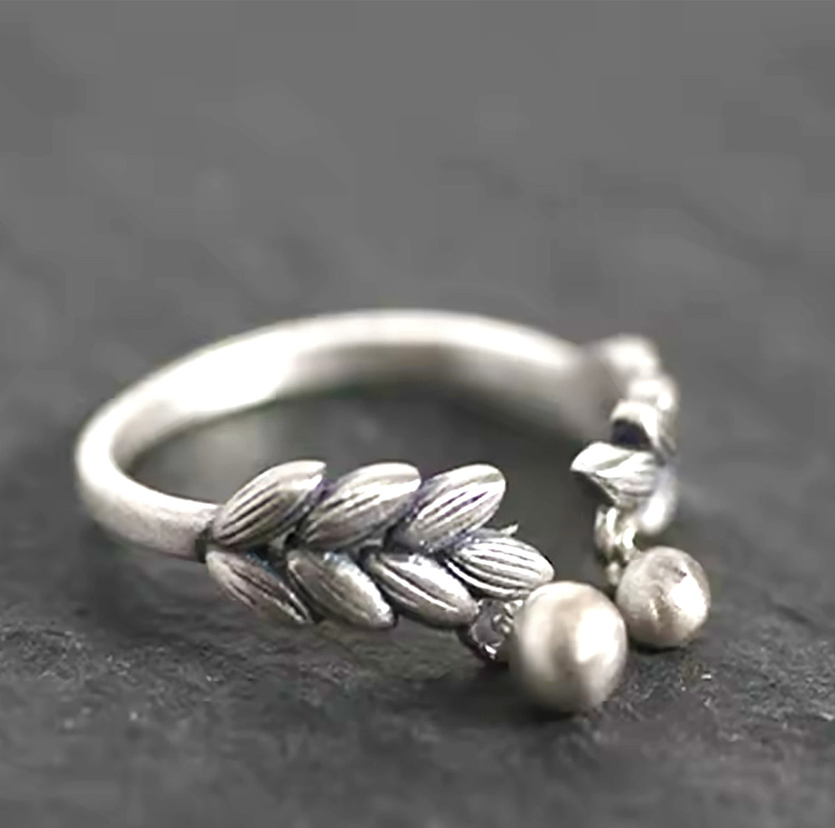 Whispers of Nature – Sterling Silver Leaf and Dangling Bead Charm Adjustable Ring