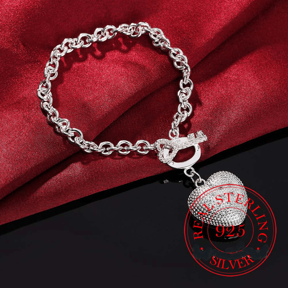 Key to My Heart Sterling Silver Puffed Heart Bracelet with Cut-Out Hearts & Florentine Finish