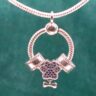Elegant Sterling Silver O Charm Push Lock Pendant with CZ and Paw Charm