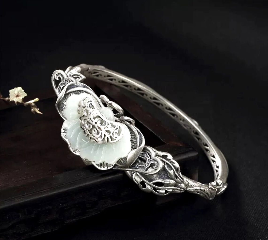 Silver-Plated Bold and Elegant Synthetic Jade Bangle Bracelet. 925ijewel.com