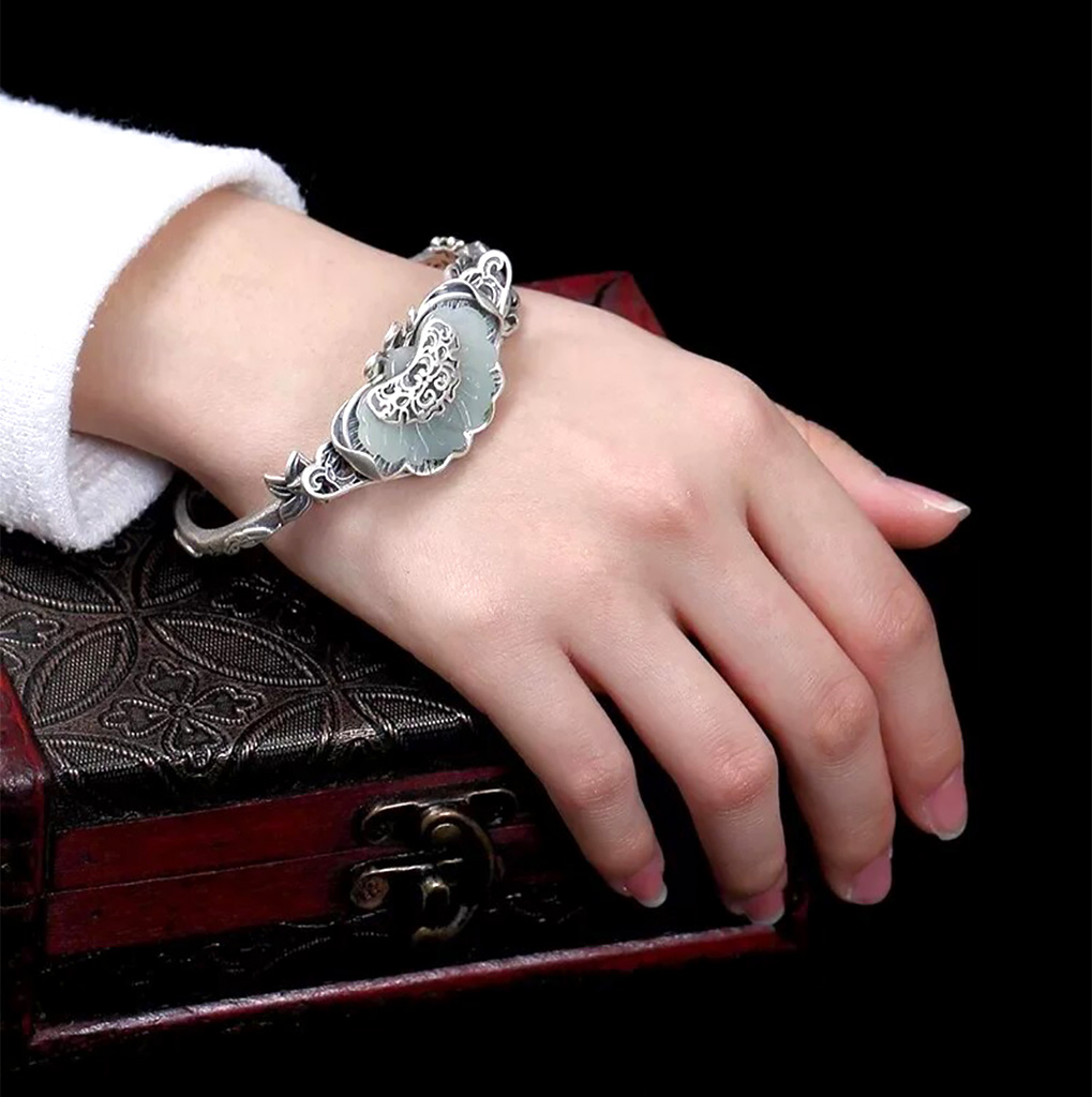 Silver-Plated Bold and Elegant Synthetic Jade Bangle Bracelet. 925ijewel.com