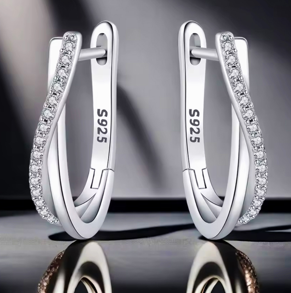 Eternal Spark Sterling Silver Duo Twist Oval Hoop Earrings. 925ijewel.com