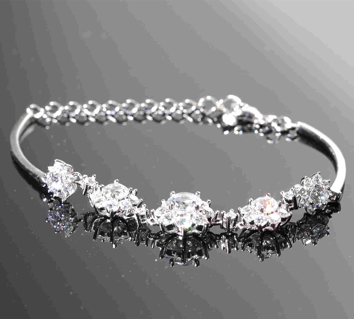 Sterling Silver 2.5 Ct CZ Graduated Cluster Adjustable Bracelet. 925ijewel.com