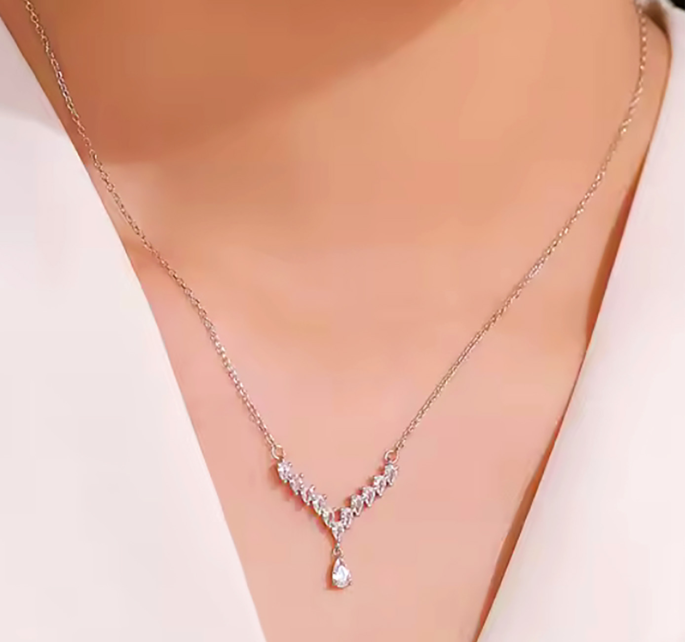 Tears of Elegance Sterling Silver V-Shape CZ Pendant. 925ijewel.com