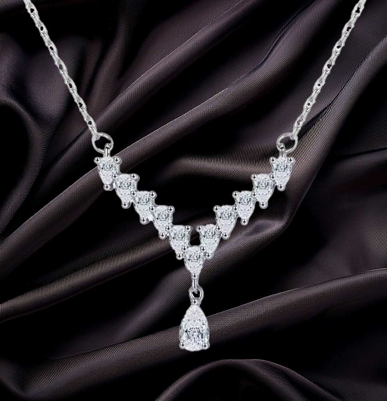 Tears of Elegance Sterling Silver V-Shape CZ Pendant. 925ijewel.com