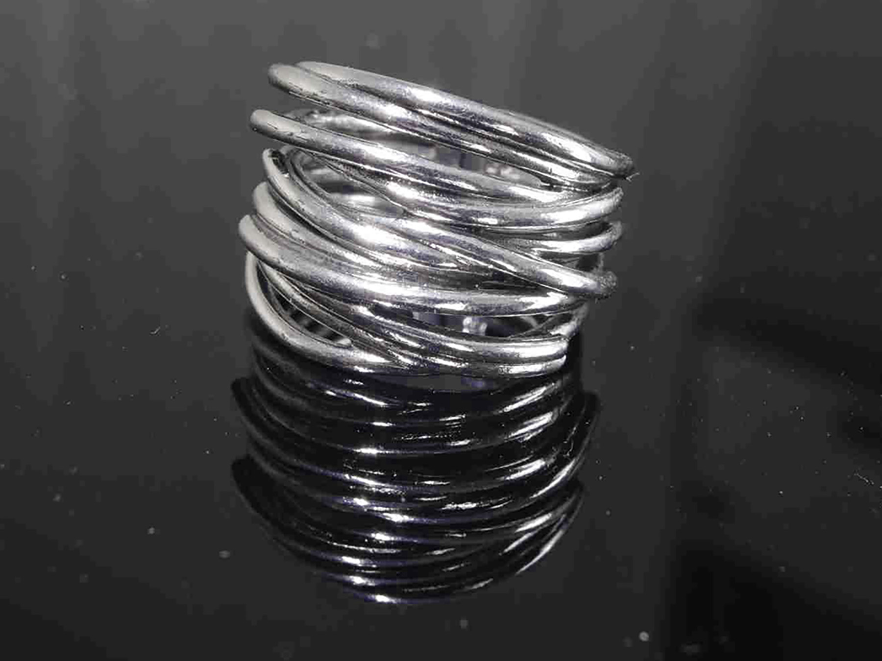 Endless Connection” Sterling Silver Adjustable Puzzle Motif Ring. 925ijewel.com