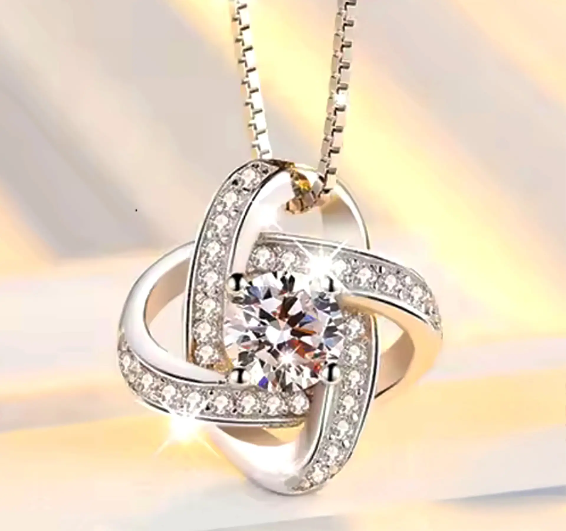 Forever Knot — 925 Sterling Silver CZ Pendant & Earrings Set. 925ijewel.com