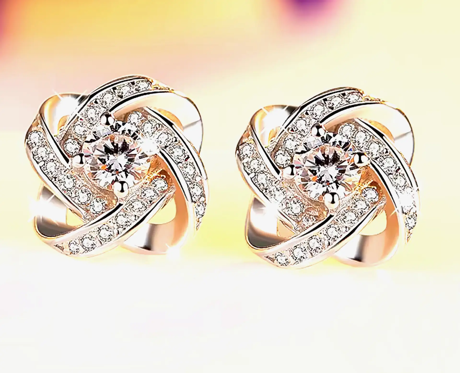 Forever Knot — 925 Sterling Silver CZ Pendant & Earrings Set. 925ijewel.com