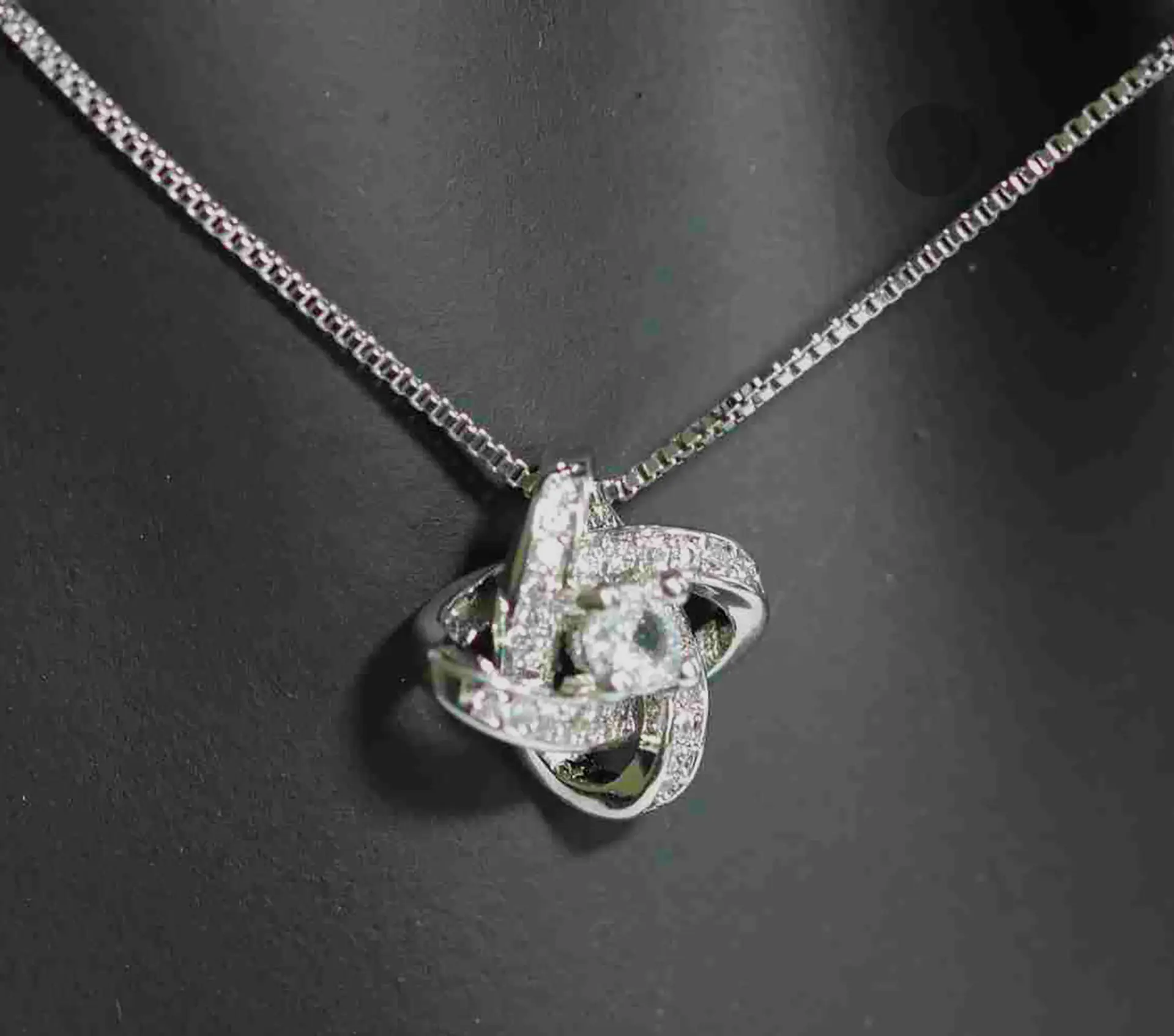 Forever Knot — 925 Sterling Silver CZ Pendant & Earrings Set. 925ijewel.com