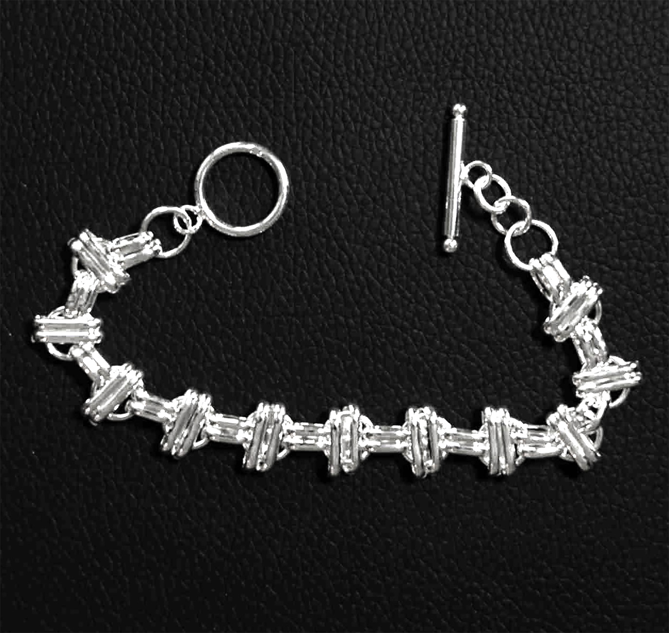 Sterling Silver Interlinked Grace Double Bar and Spaced Circles Bracelet with Toggle Clasp. 925ijewel.com